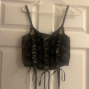 delia’s dollskill corset top 👻